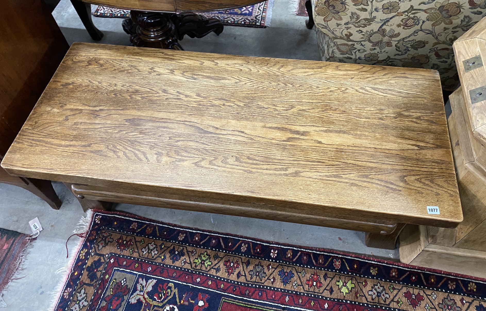 A rectangular rustic style oak coffee table width 137cm, depth 57cm, height 45cm.
